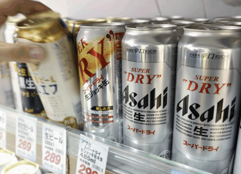Cans of beer sit on a shelf at a supermarket in Yokohama, near Tokyo Friday, Oct. 3, 2025. (Daiki Katagiri/Kyodo News via AP)