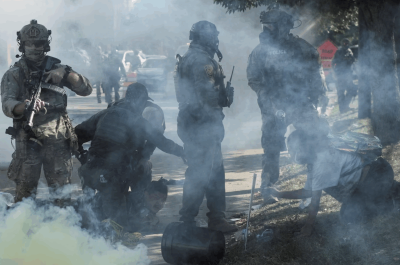 Tear gas rises during a standoff with U.S. Immigration and Customs Enforcement (ICE) and federal officers in the Little Village neighborhood of Chicago, Illinois, U.S., October 4, 2025. REUTERS/Jim Vondruska TPX IMAGES OF THE DAY Purchase Licensing Rights